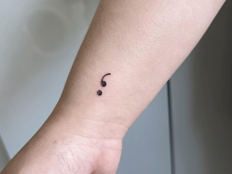 meaning of semicolon tattoo on the wrist